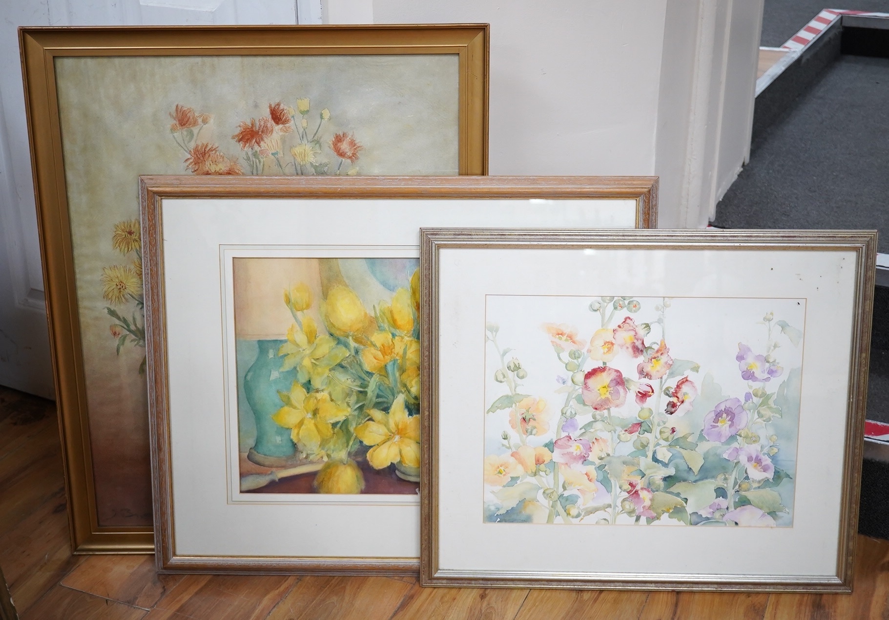 Three 20th century and Contemporary watercolours, Still lifes of flowers, including one signed M E Seaton, largest 69 x 54cm. Condition - poor to fair